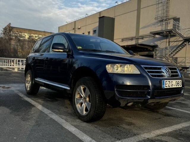 Синий Фольксваген Туарег, объемом двигателя 2.5 л и пробегом 372 тыс. км за 3799 $, фото 1 на Automoto.ua