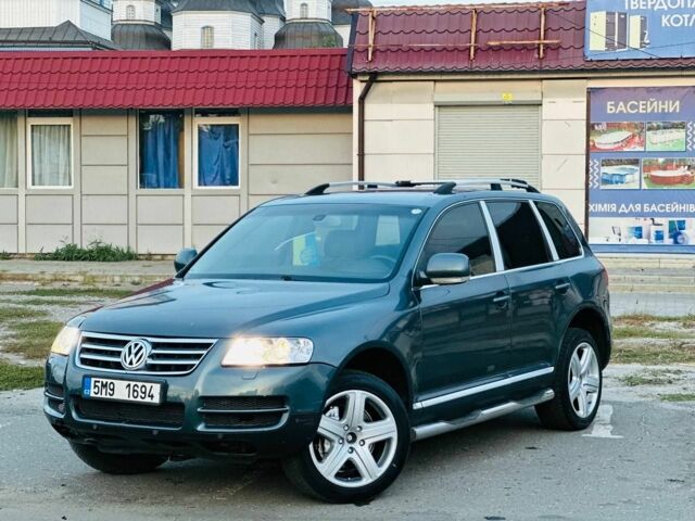 Синій Фольксваген Туарег, об'ємом двигуна 2.5 л та пробігом 200 тис. км за 4400 $, фото 1 на Automoto.ua