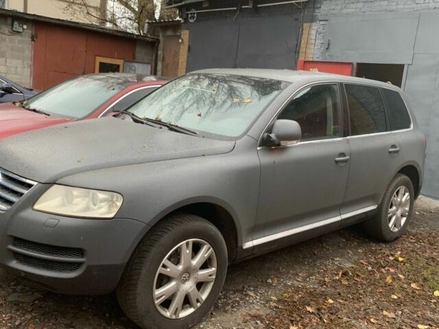 Синий Фольксваген Туарег, объемом двигателя 3 л и пробегом 261 тыс. км за 4000 $, фото 1 на Automoto.ua