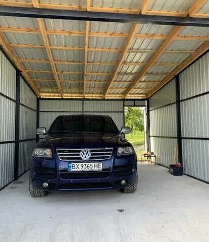 Синий Фольксваген Туарег, объемом двигателя 4.2 л и пробегом 250 тыс. км за 11000 $, фото 1 на Automoto.ua