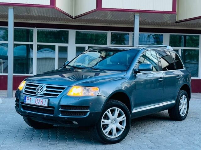 Синий Фольксваген Туарег, объемом двигателя 3 л и пробегом 230 тыс. км за 6640 $, фото 1 на Automoto.ua