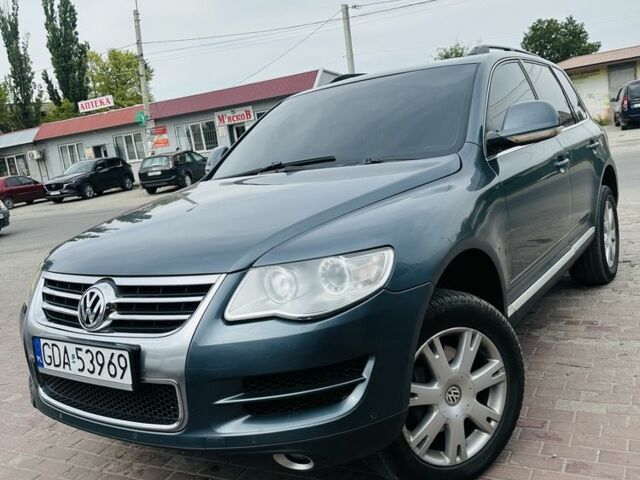 Синий Фольксваген Туарег, объемом двигателя 3 л и пробегом 270 тыс. км за 5200 $, фото 1 на Automoto.ua