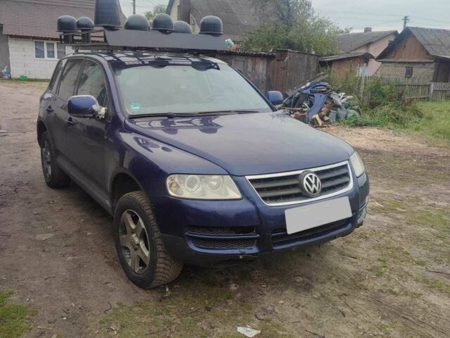 Синий Фольксваген Туарег, объемом двигателя 2.5 л и пробегом 349 тыс. км за 9000 $, фото 1 на Automoto.ua