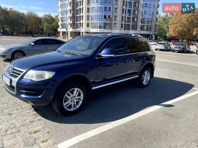 Синий Фольксваген Туарег, объемом двигателя 2.97 л и пробегом 246 тыс. км за 13000 $, фото 1 на Automoto.ua
