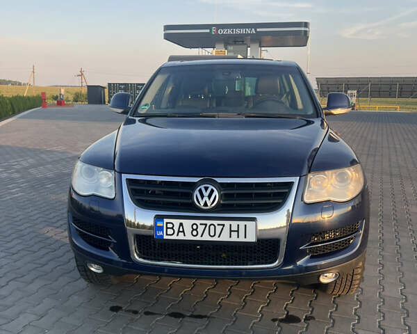 Синий Фольксваген Туарег, объемом двигателя 3 л и пробегом 235 тыс. км за 11100 $, фото 1 на Automoto.ua