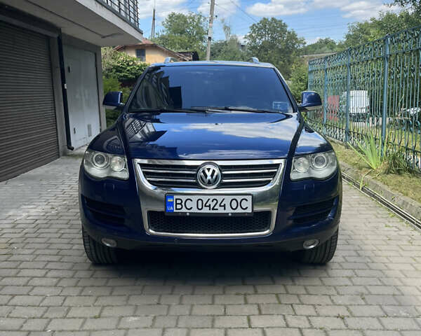 Синий Фольксваген Туарег, объемом двигателя 3 л и пробегом 386 тыс. км за 12300 $, фото 1 на Automoto.ua