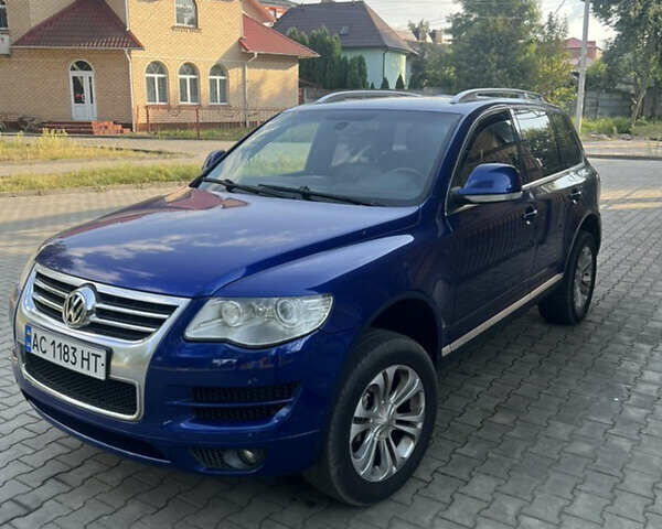 Синий Фольксваген Туарег, объемом двигателя 3 л и пробегом 265 тыс. км за 7999 $, фото 1 на Automoto.ua