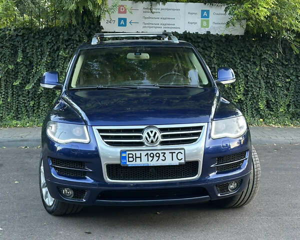 Синій Фольксваген Туарег, об'ємом двигуна 3 л та пробігом 306 тис. км за 12500 $, фото 1 на Automoto.ua