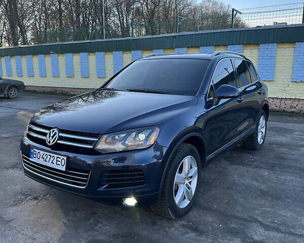 Синий Фольксваген Туарег, объемом двигателя 3 л и пробегом 290 тыс. км за 14900 $, фото 1 на Automoto.ua