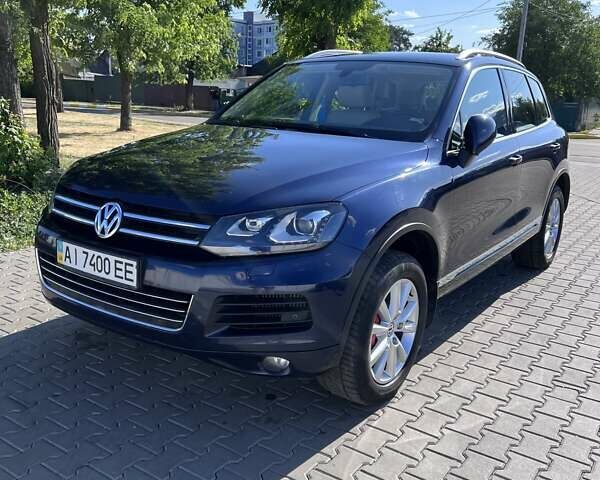 Синий Фольксваген Туарег, объемом двигателя 2.97 л и пробегом 374 тыс. км за 18900 $, фото 1 на Automoto.ua
