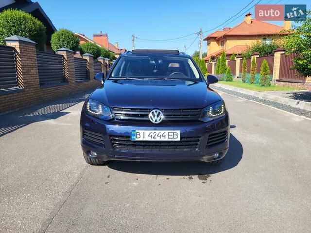 Синий Фольксваген Туарег, объемом двигателя 2.97 л и пробегом 221 тыс. км за 21400 $, фото 1 на Automoto.ua