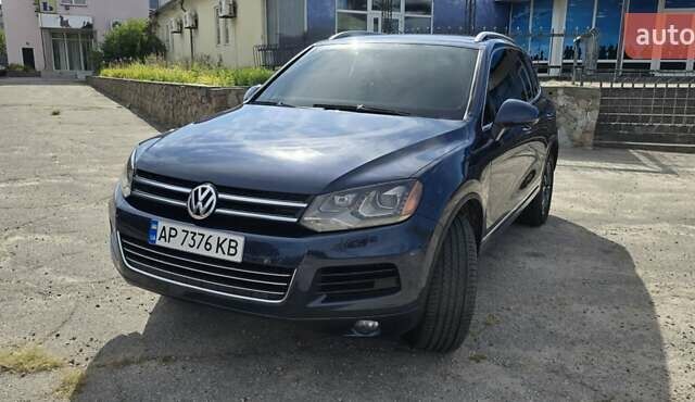 Синий Фольксваген Туарег, объемом двигателя 3 л и пробегом 214 тыс. км за 17900 $, фото 1 на Automoto.ua