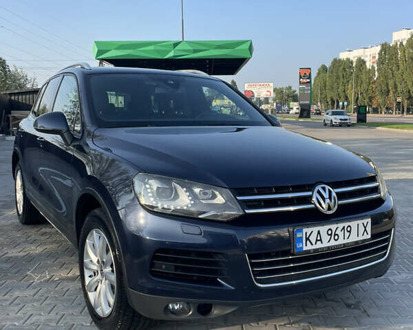 Синій Фольксваген Туарег, об'ємом двигуна 2.97 л та пробігом 335 тис. км за 17999 $, фото 1 на Automoto.ua