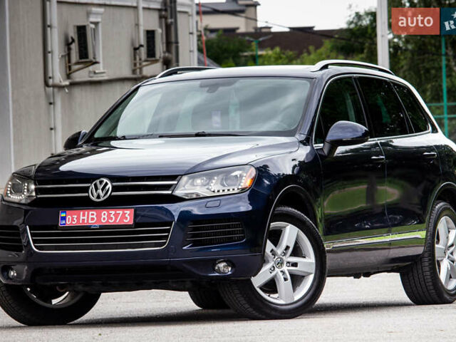 Синий Фольксваген Туарег, объемом двигателя 3 л и пробегом 211 тыс. км за 15700 $, фото 1 на Automoto.ua