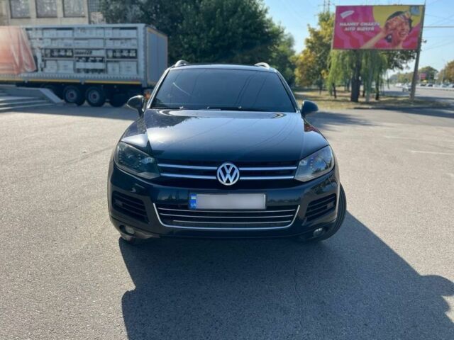 Синий Фольксваген Туарег, объемом двигателя 3 л и пробегом 250 тыс. км за 23500 $, фото 1 на Automoto.ua