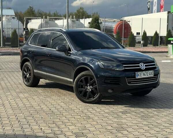 Синий Фольксваген Туарег, объемом двигателя 2.97 л и пробегом 245 тыс. км за 24500 $, фото 1 на Automoto.ua