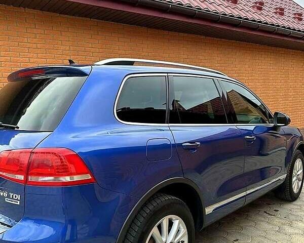 Синий Фольксваген Туарег, объемом двигателя 3 л и пробегом 199 тыс. км за 25500 $, фото 1 на Automoto.ua