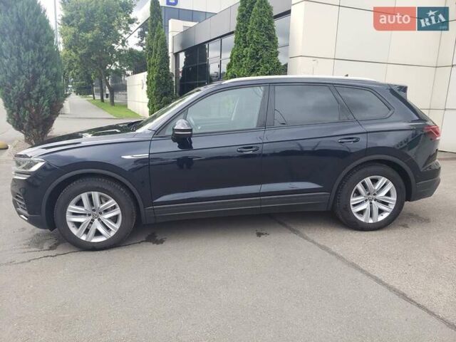 Синій Фольксваген Туарег, об'ємом двигуна 3 л та пробігом 107 тис. км за 37500 $, фото 1 на Automoto.ua