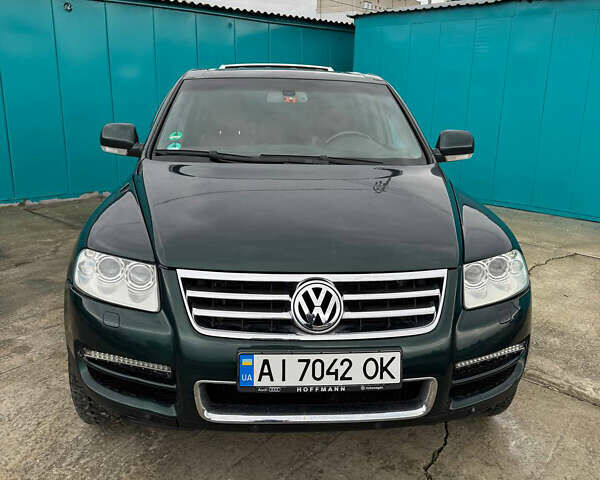 Зеленый Фольксваген Туарег, объемом двигателя 4.92 л и пробегом 201 тыс. км за 6800 $, фото 1 на Automoto.ua