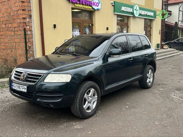 Зеленый Фольксваген Туарег, объемом двигателя 2.5 л и пробегом 375 тыс. км за 3500 $, фото 1 на Automoto.ua