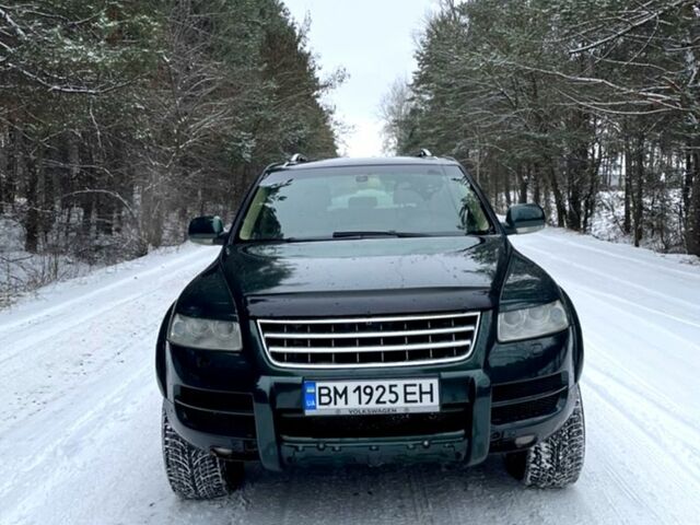 Зелений Фольксваген Туарег, об'ємом двигуна 4.2 л та пробігом 340 тис. км за 8500 $, фото 1 на Automoto.ua