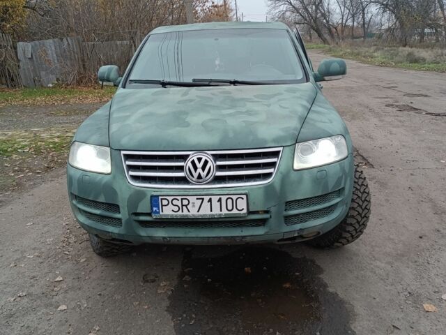 Зеленый Фольксваген Туарег, объемом двигателя 2.5 л и пробегом 300 тыс. км за 5000 $, фото 1 на Automoto.ua
