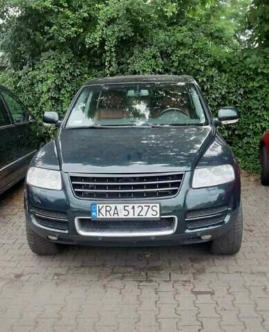 Зелений Фольксваген Туарег, об'ємом двигуна 3 л та пробігом 265 тис. км за 7000 $, фото 1 на Automoto.ua