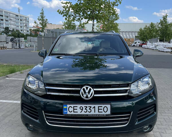 Зеленый Фольксваген Туарег, объемом двигателя 2.97 л и пробегом 279 тыс. км за 22000 $, фото 1 на Automoto.ua