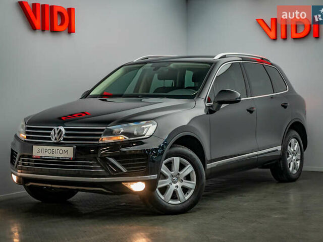 Зеленый Фольксваген Туарег, объемом двигателя 3 л и пробегом 212 тыс. км за 23465 $, фото 1 на Automoto.ua