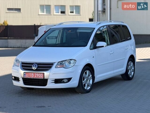 Белый Фольксваген Туран, объемом двигателя 1.4 л и пробегом 180 тыс. км за 6600 $, фото 1 на Automoto.ua