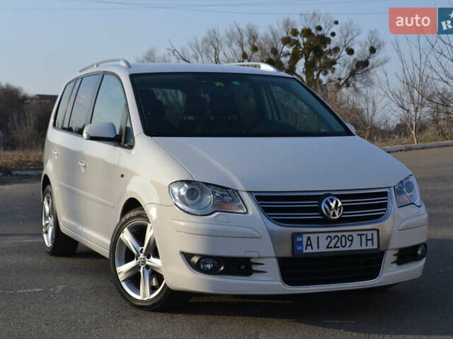 Білий Фольксваген Туран, об'ємом двигуна 1.39 л та пробігом 184 тис. км за 8550 $, фото 1 на Automoto.ua