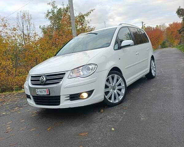 Белый Фольксваген Туран, объемом двигателя 1.4 л и пробегом 182 тыс. км за 8400 $, фото 1 на Automoto.ua