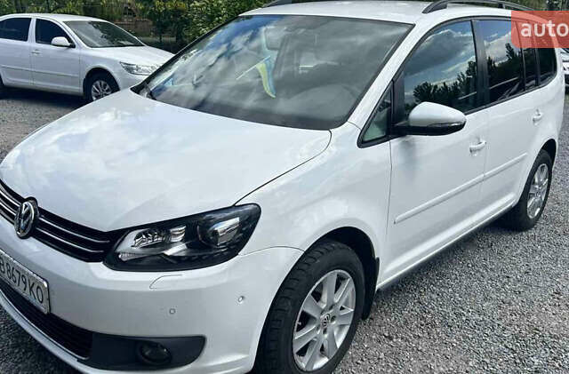 Білий Фольксваген Туран, об'ємом двигуна 1.39 л та пробігом 258 тис. км за 7000 $, фото 1 на Automoto.ua