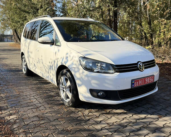 Белый Фольксваген Туран, объемом двигателя 1.4 л и пробегом 161 тыс. км за 11900 $, фото 1 на Automoto.ua
