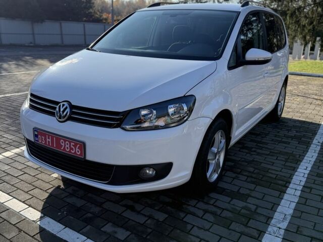 Белый Фольксваген Туран, объемом двигателя 1.4 л и пробегом 161 тыс. км за 11900 $, фото 1 на Automoto.ua