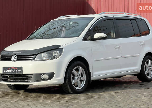 Белый Фольксваген Туран, объемом двигателя 1.97 л и пробегом 264 тыс. км за 11999 $, фото 1 на Automoto.ua