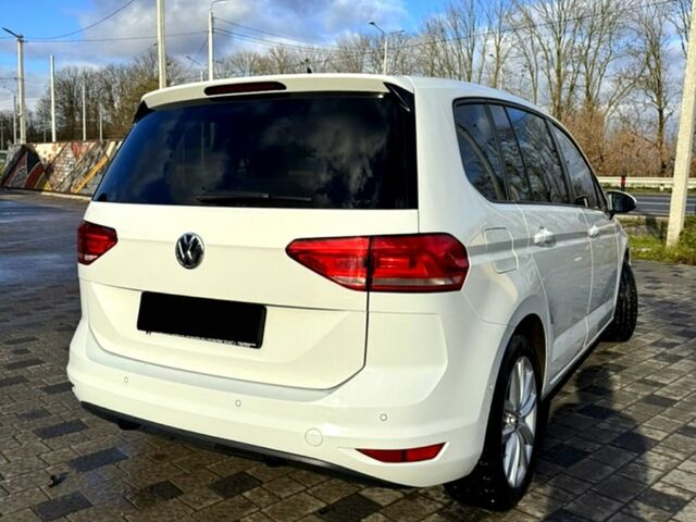 Білий Фольксваген Туран, об'ємом двигуна 2 л та пробігом 187 тис. км за 15500 $, фото 1 на Automoto.ua