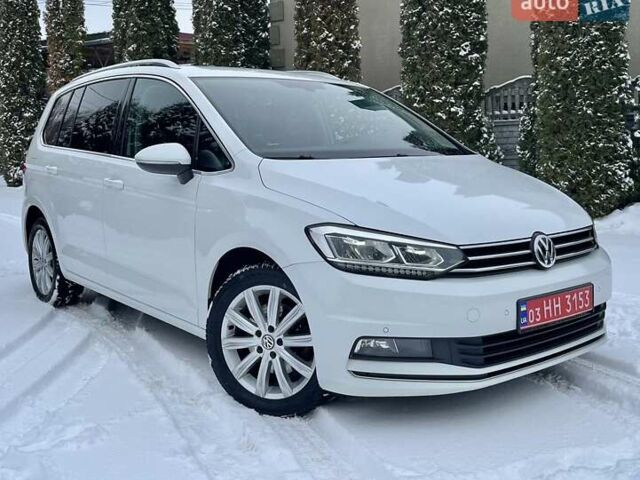 Білий Фольксваген Туран, об'ємом двигуна 1.97 л та пробігом 218 тис. км за 16999 $, фото 1 на Automoto.ua