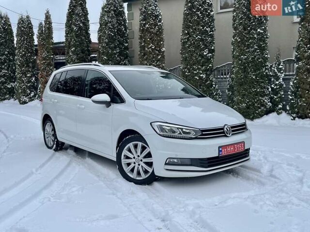 Белый Фольксваген Туран, объемом двигателя 1.97 л и пробегом 218 тыс. км за 16899 $, фото 1 на Automoto.ua