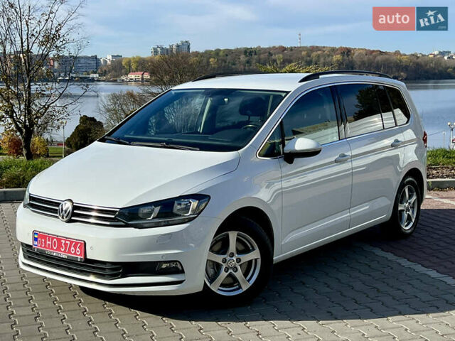 Белый Фольксваген Туран, объемом двигателя 2 л и пробегом 220 тыс. км за 18390 $, фото 1 на Automoto.ua