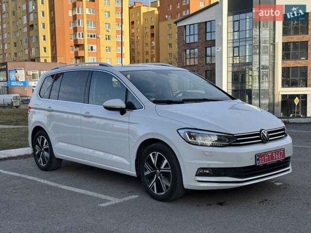 Білий Фольксваген Туран, об'ємом двигуна 1.97 л та пробігом 220 тис. км за 22699 $, фото 1 на Automoto.ua