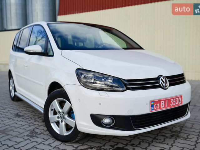 Белый Фольксваген Туран, объемом двигателя 2 л и пробегом 221 тыс. км за 11700 $, фото 1 на Automoto.ua