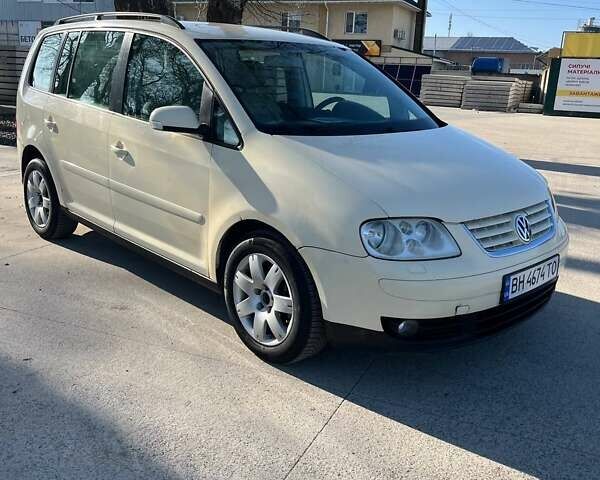 Бежевий Фольксваген Туран, об'ємом двигуна 1.9 л та пробігом 340 тис. км за 5400 $, фото 1 на Automoto.ua