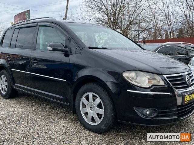 Черный Фольксваген Туран, объемом двигателя 1.9 л и пробегом 332 тыс. км за 6999 $, фото 1 на Automoto.ua