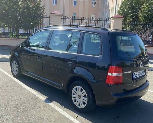 Чорний Фольксваген Туран, об'ємом двигуна 1.6 л та пробігом 206 тис. км за 5400 $, фото 1 на Automoto.ua