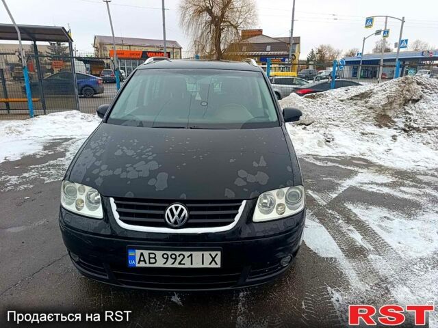 Черный Фольксваген Туран, объемом двигателя 1.6 л и пробегом 272 тыс. км за 5100 $, фото 1 на Automoto.ua