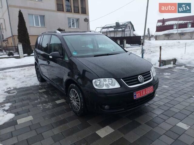 Черный Фольксваген Туран, объемом двигателя 1.6 л и пробегом 177 тыс. км за 4700 $, фото 1 на Automoto.ua