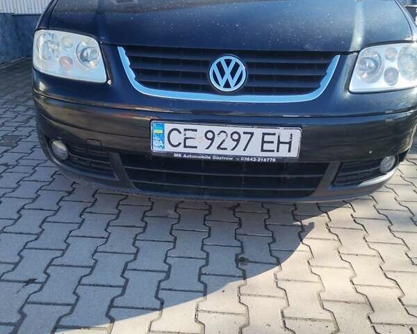 Черный Фольксваген Туран, объемом двигателя 1.6 л и пробегом 218 тыс. км за 5600 $, фото 1 на Automoto.ua