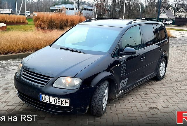 Черный Фольксваген Туран, объемом двигателя 2 л и пробегом 388 тыс. км за 2700 $, фото 1 на Automoto.ua