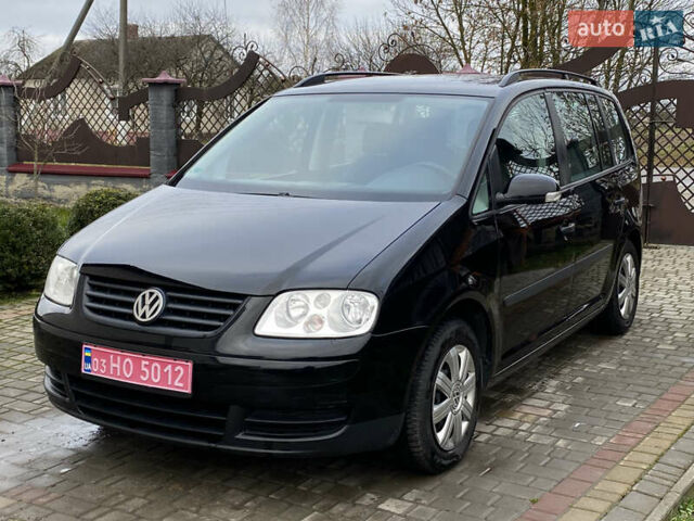 Черный Фольксваген Туран, объемом двигателя 1.6 л и пробегом 222 тыс. км за 4900 $, фото 1 на Automoto.ua